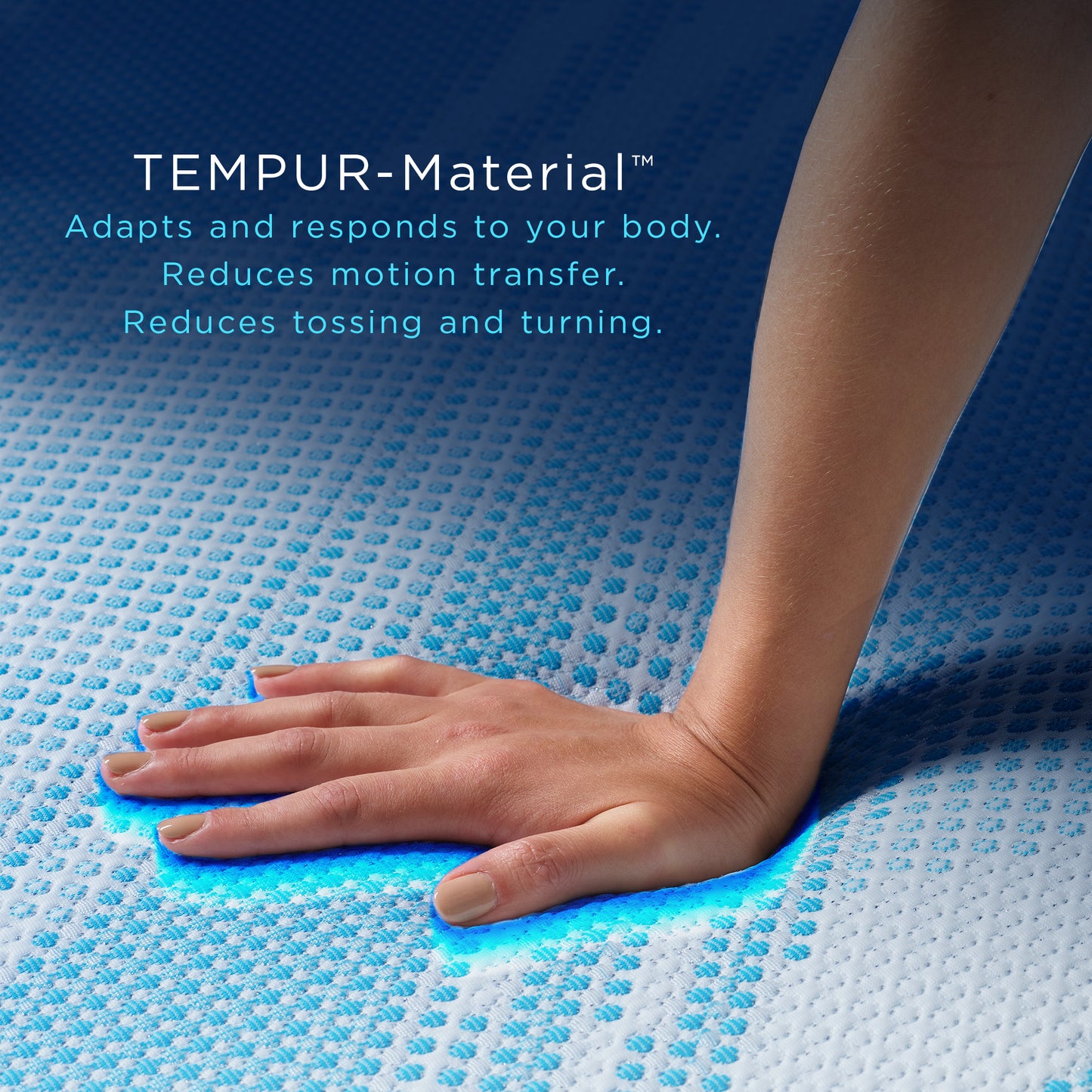 Close-up of a hand pressing into the TEMPUR®-Material surface of a Breeze® mattress, demonstrating adaptive body contouring, pressure relief, and motion isolation.