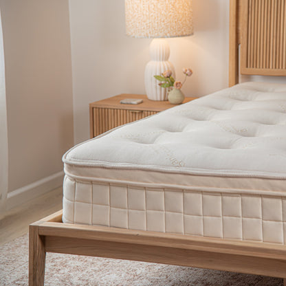 Corner view of the Naturepedic Concerto Organic Pillow Top Mattress
