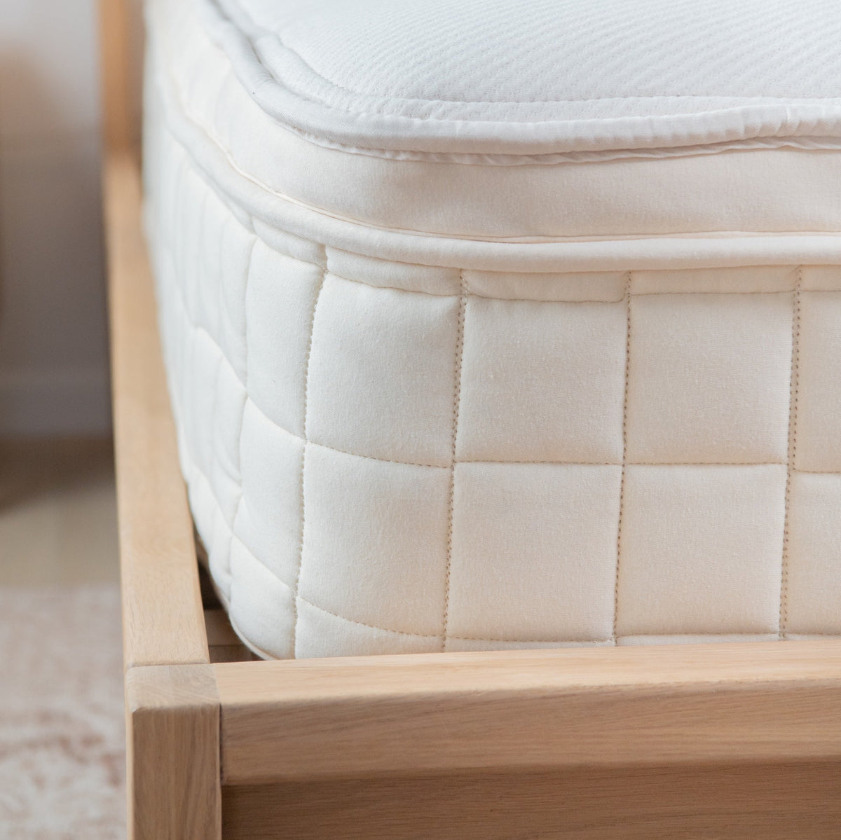 Pillow top border detail of the Naturepedic Concerto Organic Pillow Top Mattress