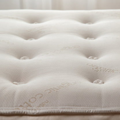 Hand-tufted pillow top surface of the Naturepedic Concerto Organic Pillow Top Mattress