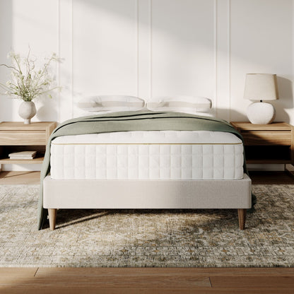 Naturepedic EOS Classic Organic Mattress on a bed in a bedroom