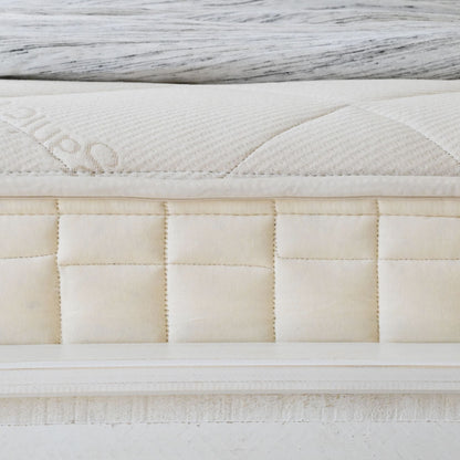 Quilted border detail of the Naturepedic Serenade Organic Hybrid Mattress - Firm