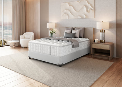 Colchón Aireloom Preferred Timeless Odyssey Luxetop M1 Luxury Firm en un dormitorio, vista lateral