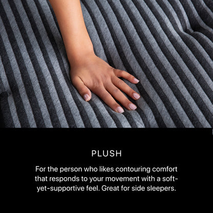 Hand pressing Beautyrest Black Series One Plush mattress surface – plush comfort with contouring pressure relief, ideal for side sleepers. 