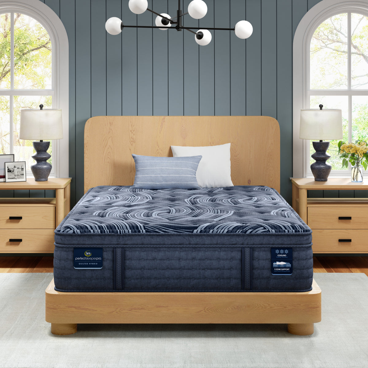 Serta Perfect Sleeper Pro Valais Plush Pillow Top Mattress in a bedroom