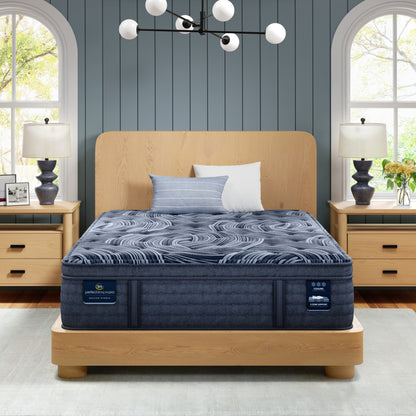 Serta Perfect Sleeper Pro Valais Plush Pillow Top Mattress in a bedroom