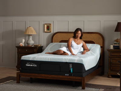 Woman enjoying plush support on the Tempur-Pedic ProAdapt Medium Mattress, luxury mattress for back sleepers, available at Aventura Mattress Miami.