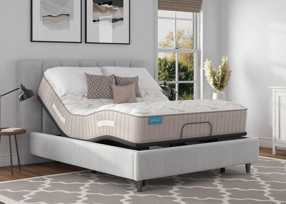 Sherwood Bedding Approachable Medium Tight Top mattress, on an adjustable base in a styled bedroom