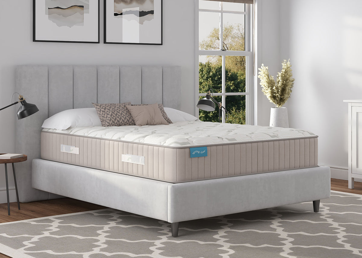 Sherwood Bedding Approachable Medium Tight Top mattress, in a styled bedroom