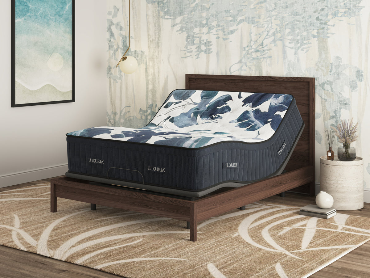 Sherwood Bedding Luxuria Firm Euro Top mattress, on an adjustable base in a styled bedroom