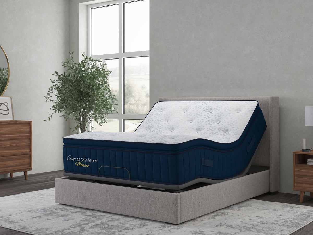 Sherwood Bedding Monaco 2.0 Soft Pillow Top mattress, on an adjustable base in a styled bedroom