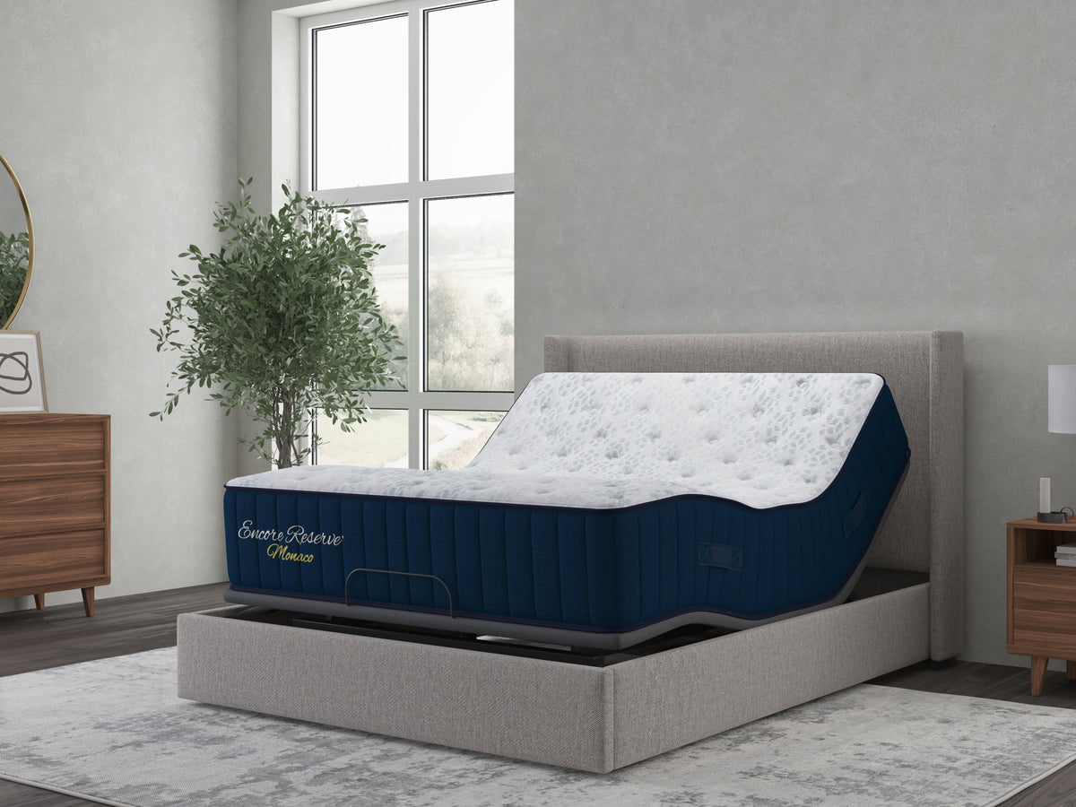Sherwood Bedding Monaco 2.0 Soft Tight Top mattress, on an adjustable base in a styled bedroom
