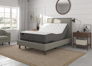 Colchón Sherwood Bedding Normandy Tight Top Ultra Firm en un dormitorio decorado