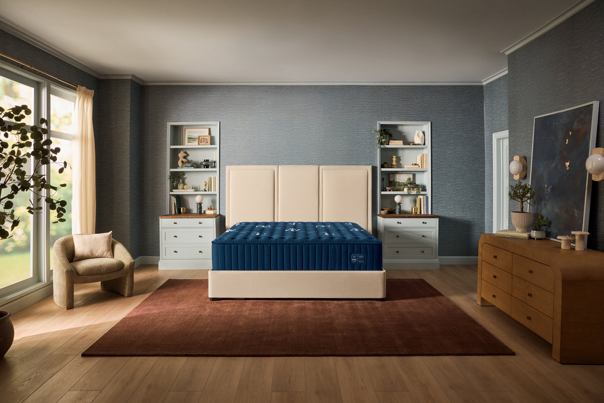 Stearns & Foster Estate Firm Tight Top II mattress in a styled bedroom, front view