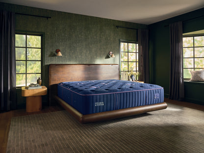 Stearns & Foster Legacy Medium Tight Top II mattress in a styled bedroom, three-quarter view
