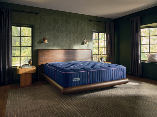 Stearns & Foster Legacy Medium Tight Top II mattress in a styled bedroom, three-quarter view