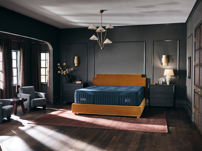 Stearns & Foster Reserve Medium Hybrid II mattress in a styled bedroom, three-quarter view