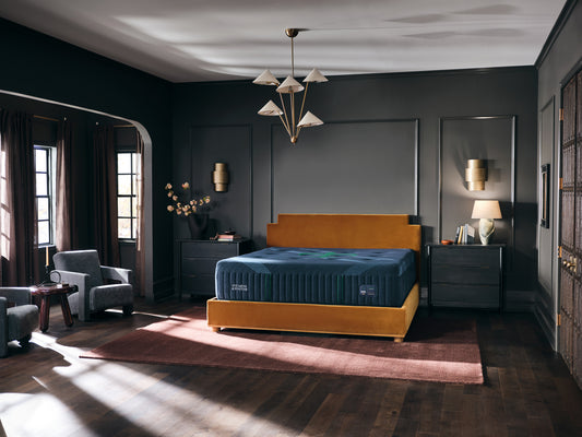 Stearns & Foster Reserve Medium Hybrid II mattress in a styled bedroom, three-quarter view