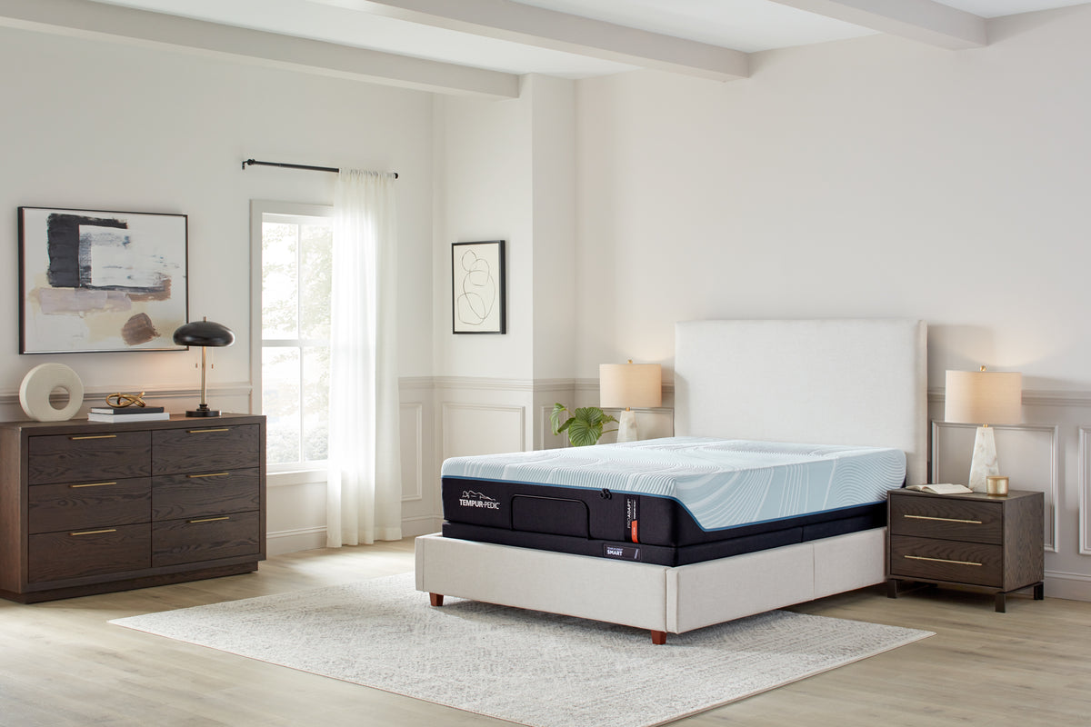 Tempur-Pedic ProAdapt 2.0 Firm mattress, in a styled bedroom, three-quarter view
