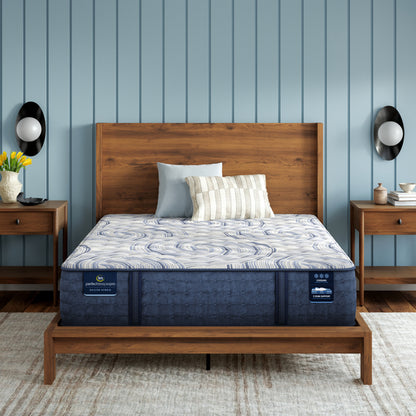 Serta Perfect Sleeper Pro Hampton Extra Firm Mattress in a bedroom