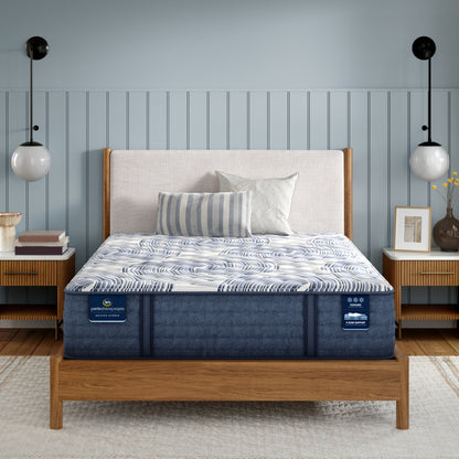Serta Perfect Sleeper Pro Geneva Firm Mattress in a bedroom